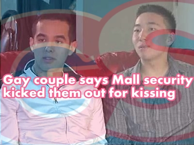 gay-couple-kss-in-mall.jpg (82580 bytes)